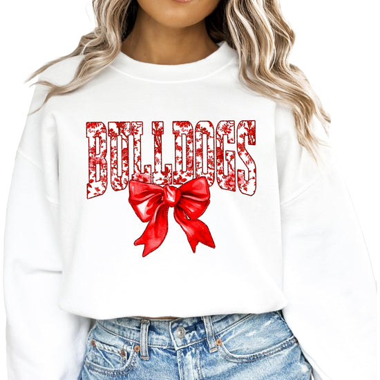 Youth girl modeling Bulldogs team spirit sweatshirt