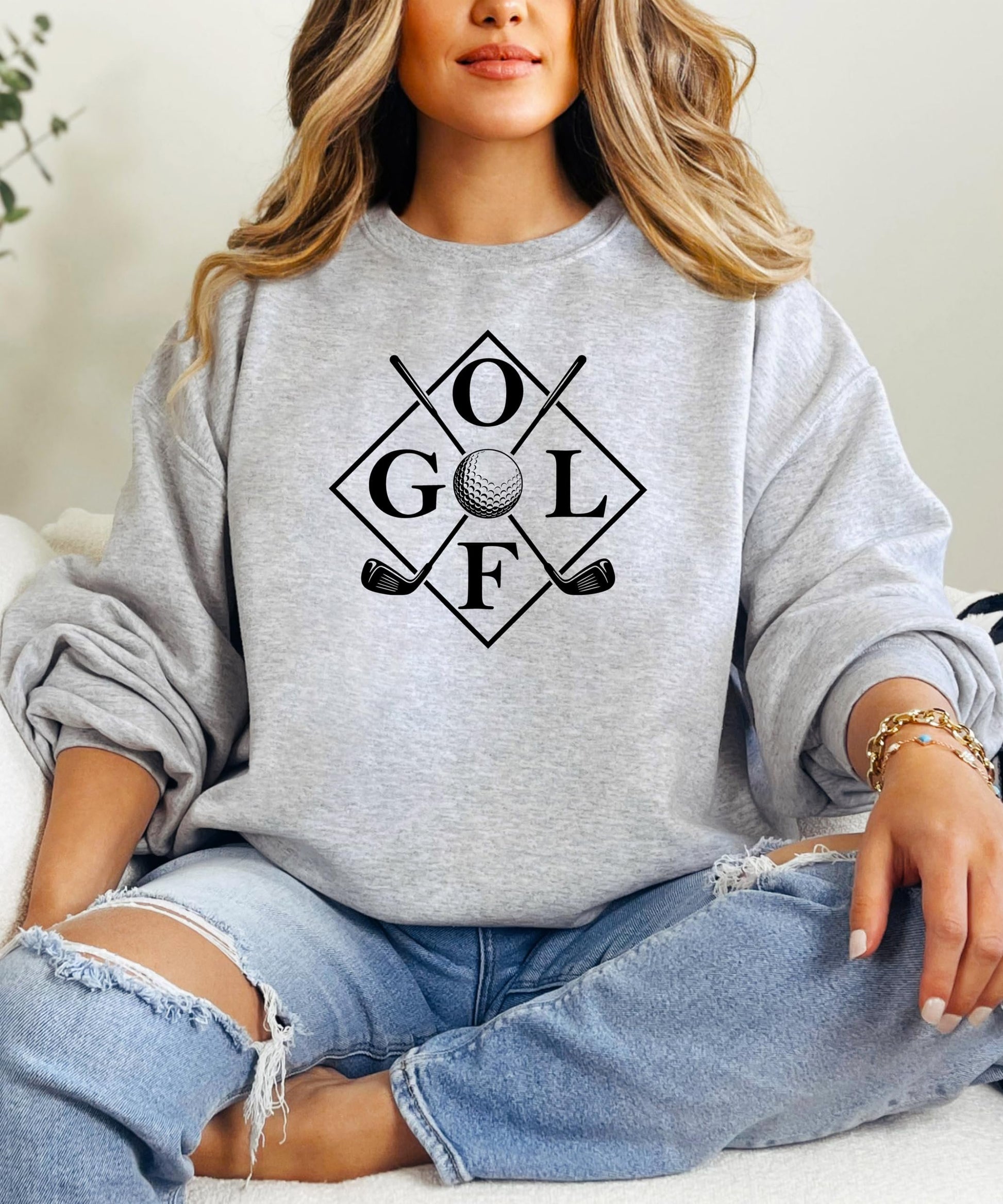 Back view of white golf sweatshirt showing design placement