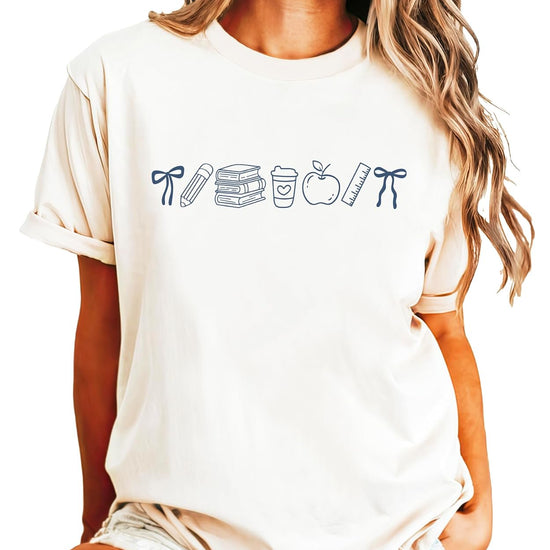 Back to school graphic tee in Natural color with coquette bow and school supplies design by Olive Loves Apple