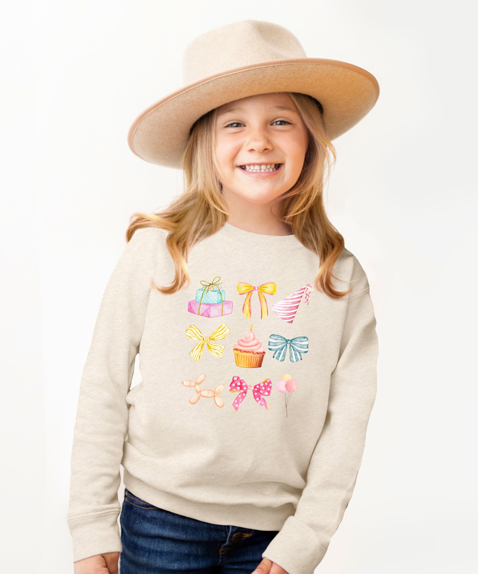 Olive Loves Apple pastel birthday sweatshirt for girls in soft pink with bow and cupcake design