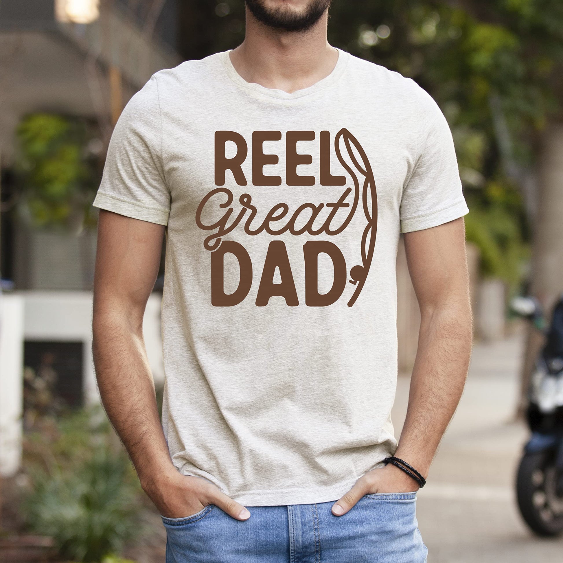 Reel Great Dad Father's Day fishing shirt detail shot on red tee