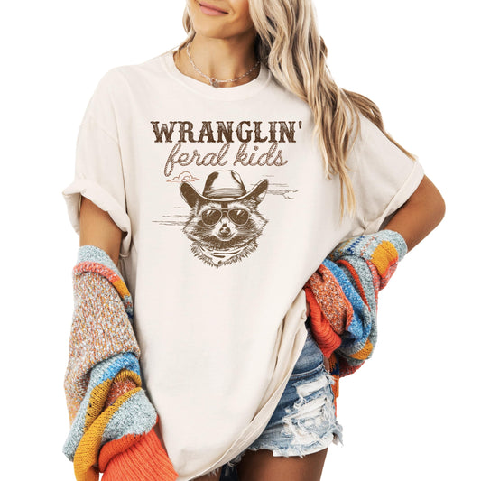 Wranglin' Feral Kids Shirt for Women Funny Graphic Cowboy Raccoon T-Shirt for Mom
