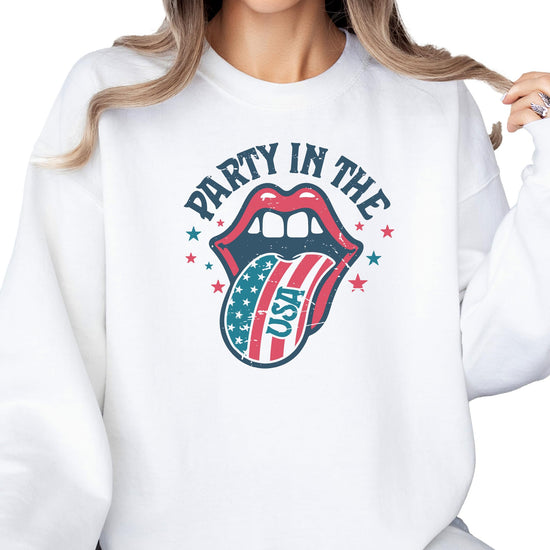 Close-up of Party In The USA retro graphic sweatshirt showing bold patriotic red, white, and blue print detail