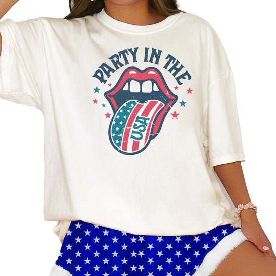 Close-up view of retro rock and roll tongue graphic with patriotic stars
