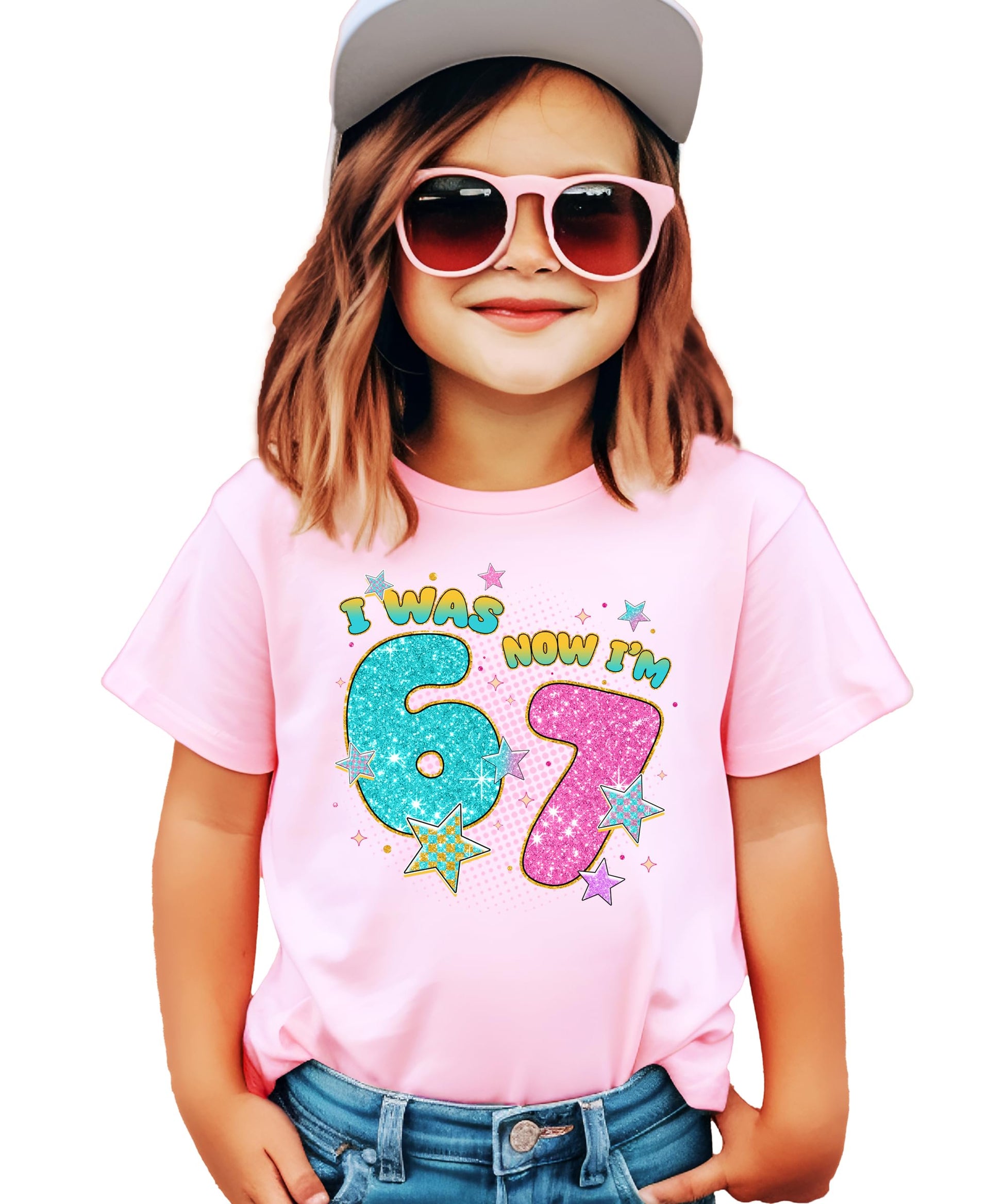 Close-up of glitter ink-printed 'I Was 6 Now I'm 7' design on pink youth t-shirt