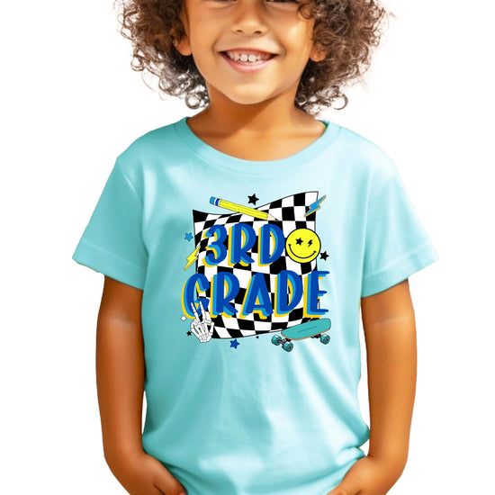 Boys wearing retro 3rd grade skateboard tee, full body view showing relaxed fit
