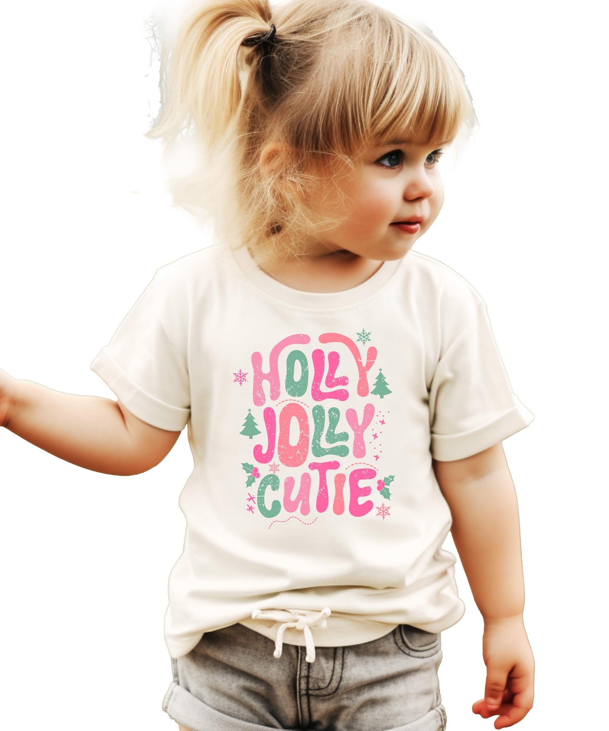 Detail shot of festive holiday graphic tee for girls featuring snowflakes and Christmas tree design elements