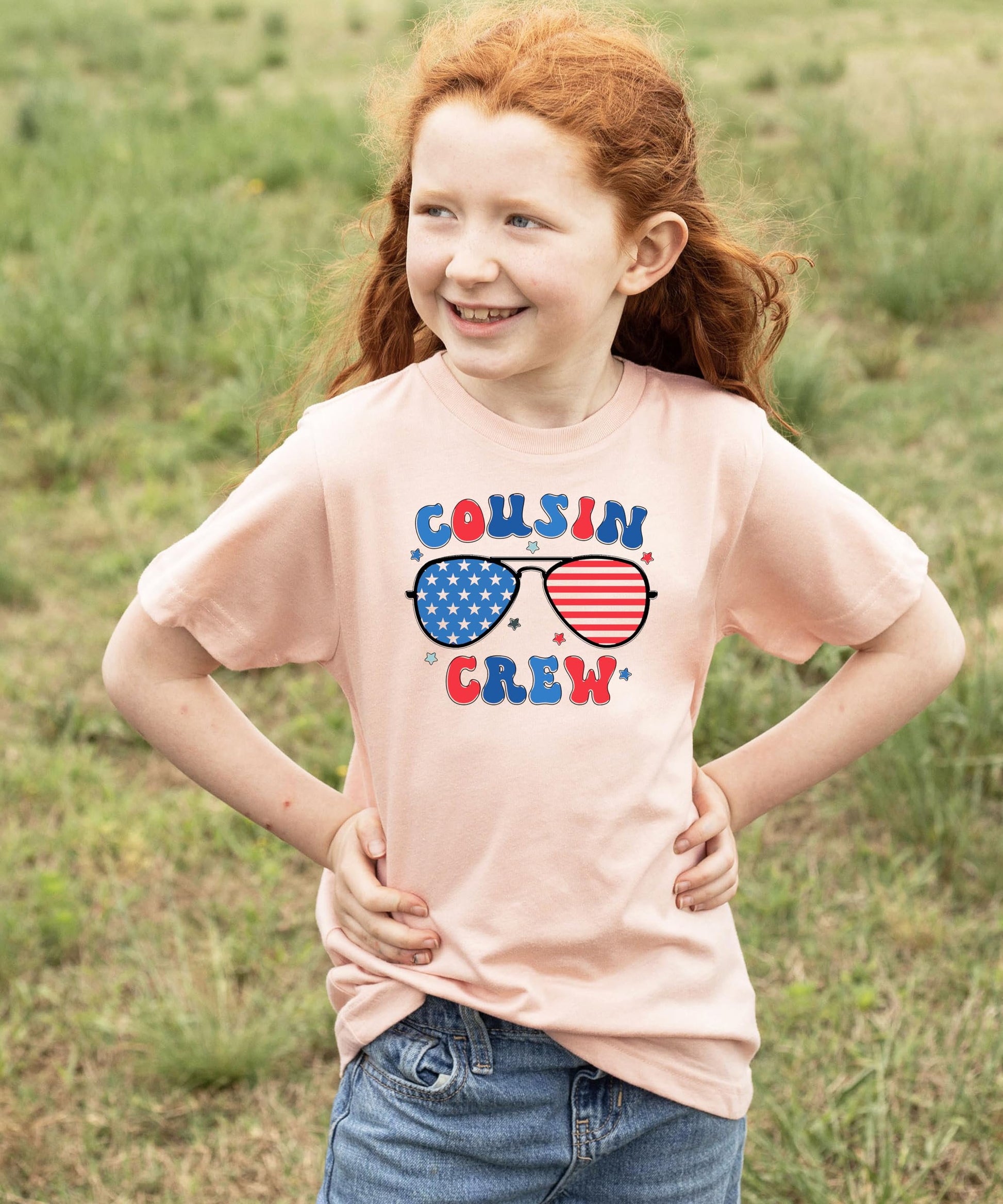 Full front view of Cousin Crew patriotic youth tee with red white blue sunglasses design