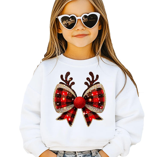 Flat lay of red and black check Christmas bow reindeer antlers tee showing full graphic design