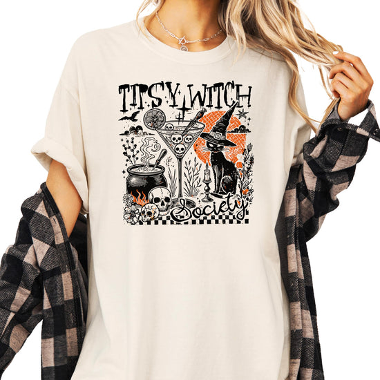 Detail shot of witchy graphic print on black Halloween t-shirt from Olive Loves Apple