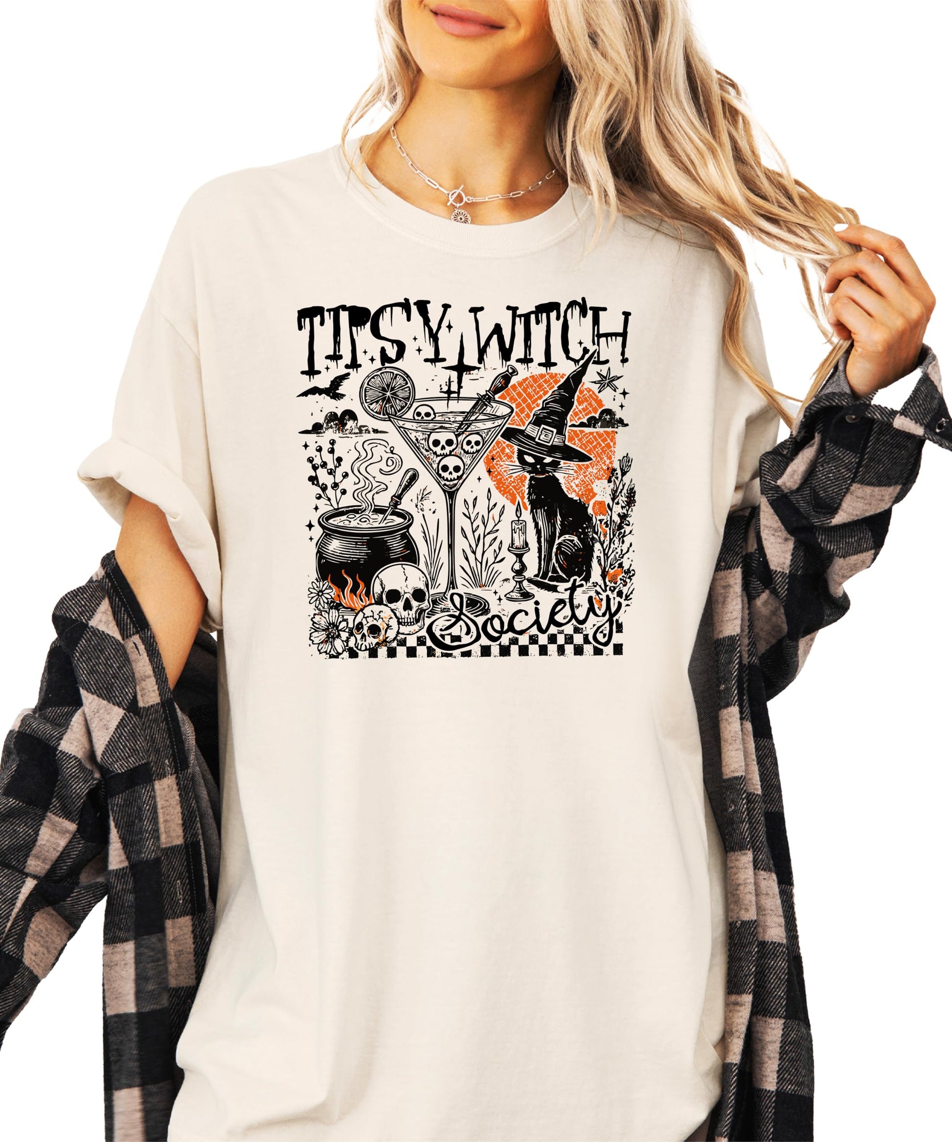 Detail shot of witchy graphic print on black Halloween t-shirt from Olive Loves Apple