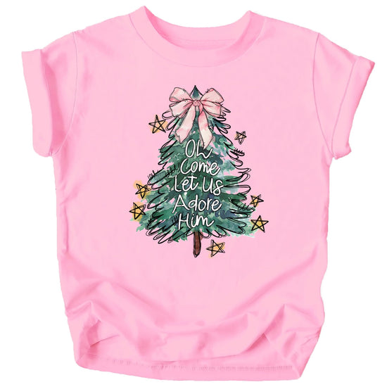 Front view of Oh Come Let Us Adore Him holiday shirt for women and teens in pink