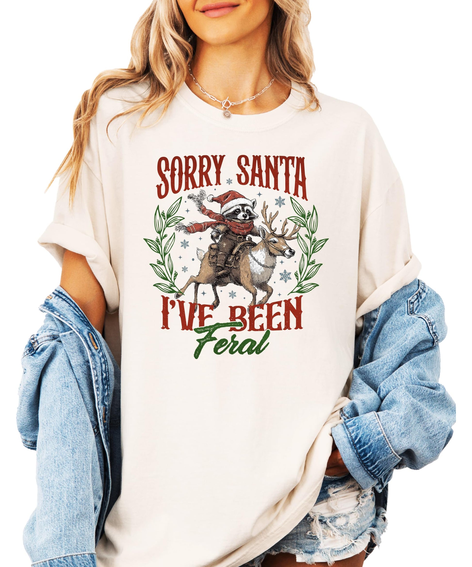 Seafoam green funny holiday tee for women and teens featuring raccoon reindeer Christmas graphic
