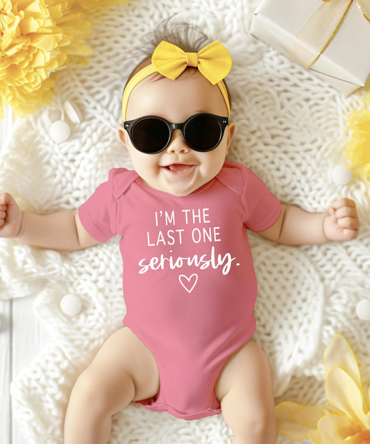 Olive Loves Apple funny newborn bodysuit in white with mauve accent, perfect for baby shower gifting