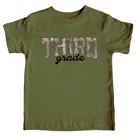 Kids third grade camo graphic tee with bold varsity lettering and woodland camouflage leaf print