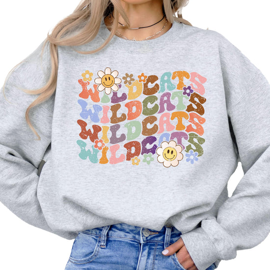 Detail shot of high-quality rainbow Wildcats print on gray crewneck sweatshirt