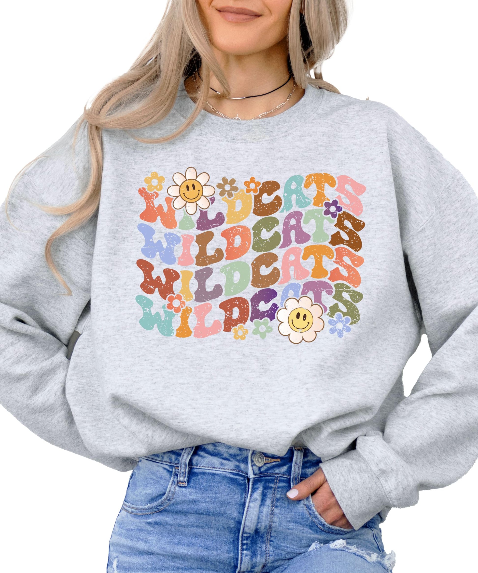 Detail shot of high-quality rainbow Wildcats print on gray crewneck sweatshirt