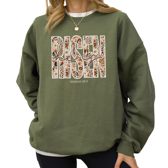 Women's army green He Is Risen sweatshirt with ink-printed floral pearl design inspired by Matthew 28:6