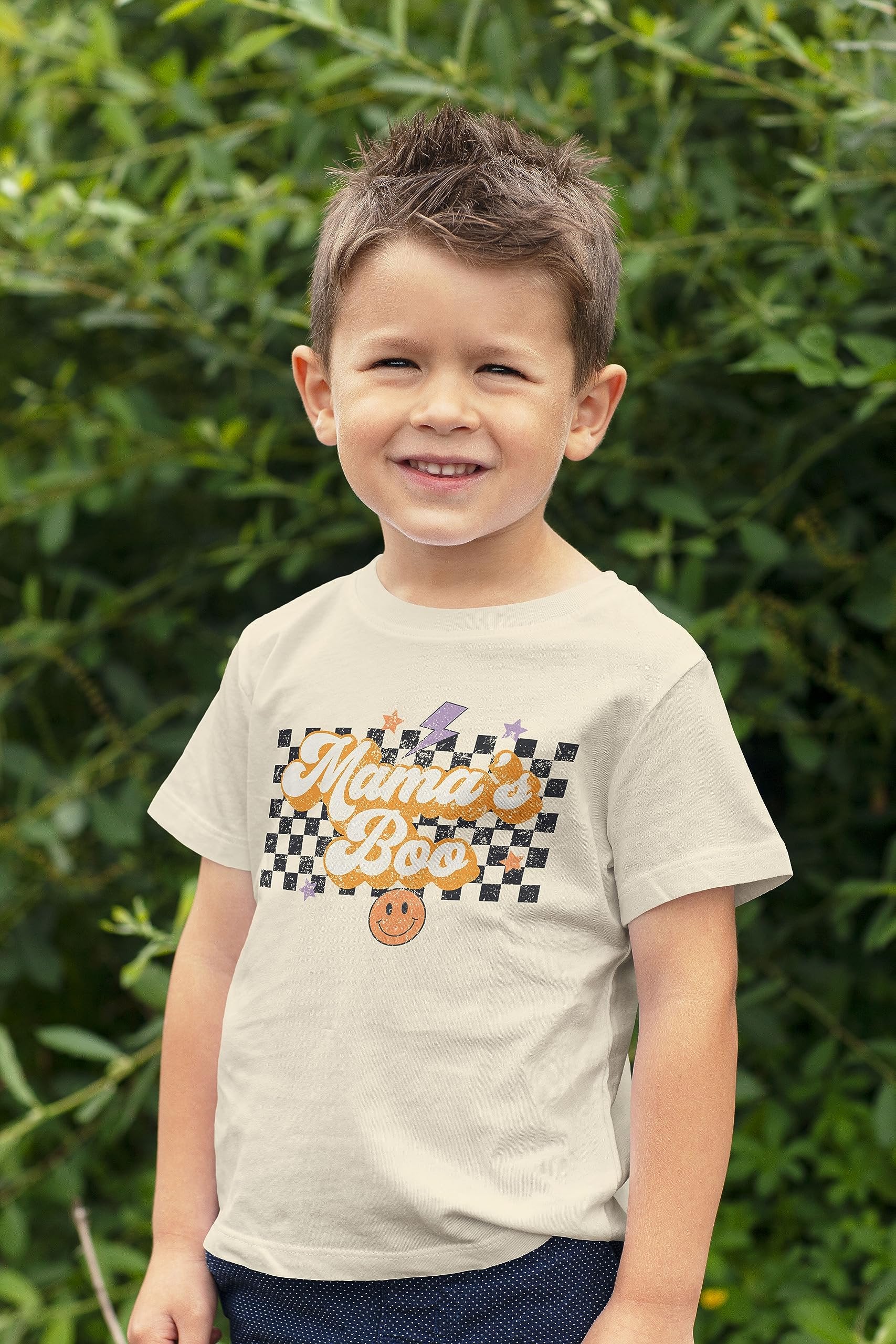 Spooky Mom Halloween shirt laid flat showing full graphic design on natural fabric