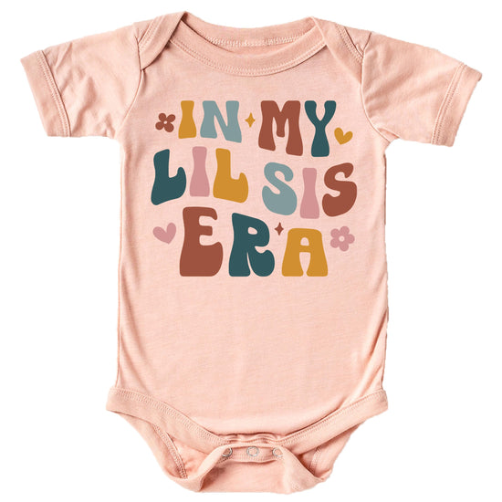 Little Sister Era baby bodysuit close-up showing vibrant graphic print detail