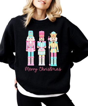 Pastel nutcracker Merry Christmas sweatshirt with colorful holiday design on black pullover