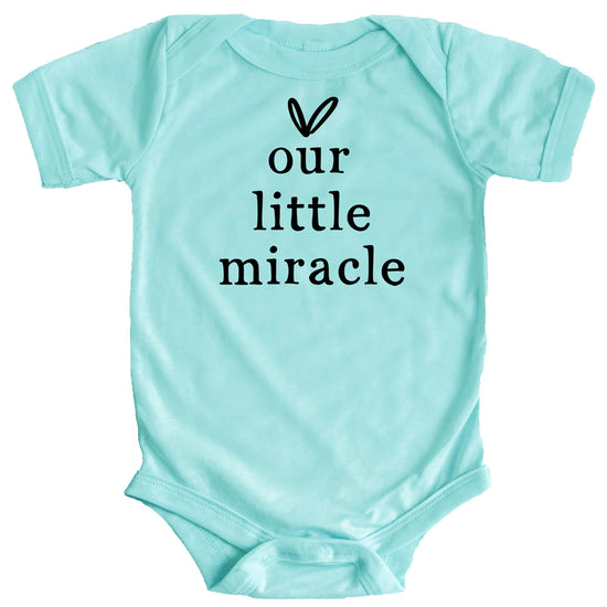 Our Little Miracle heart graphic infant bodysuit in white print on military green, front view