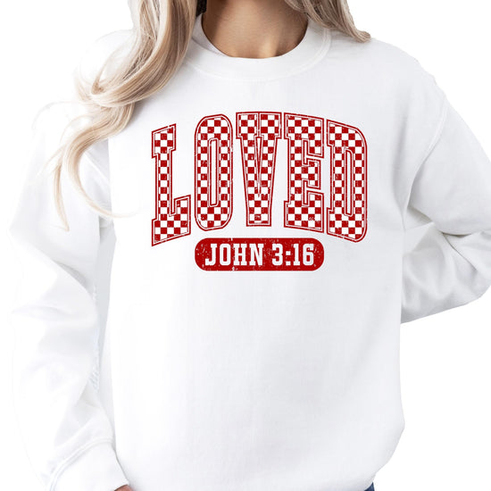Close-up of Loved John 3:16 red checkered graphic print on a gray Valentine's sweatshirt