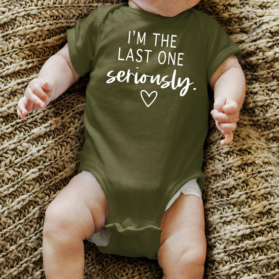 I'm The Last One Seriously baby bodysuit displayed as a gift idea for last-baby pregnancy reveal