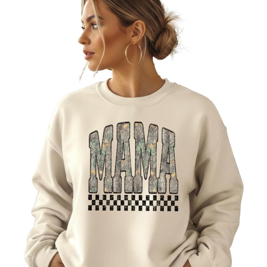 Lifestyle shot of woman wearing Mama Camo distressed crewneck sweatshirt