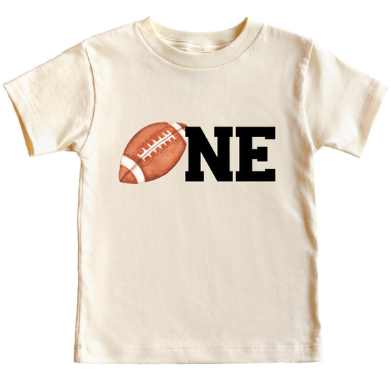 Close-up of football-themed first birthday graphic print on natural tee