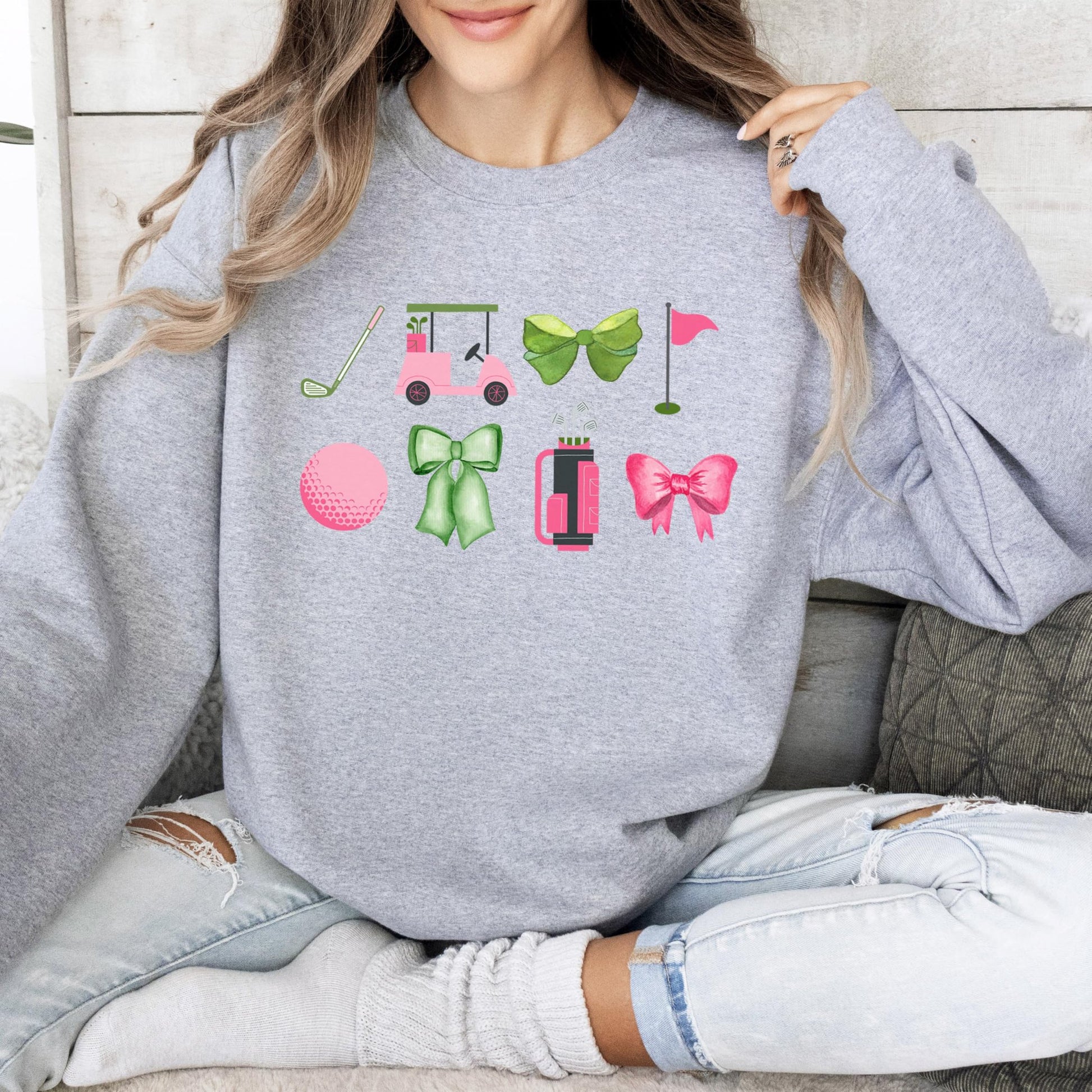 Detail shot of high-quality print on girly golf sweatshirt for women