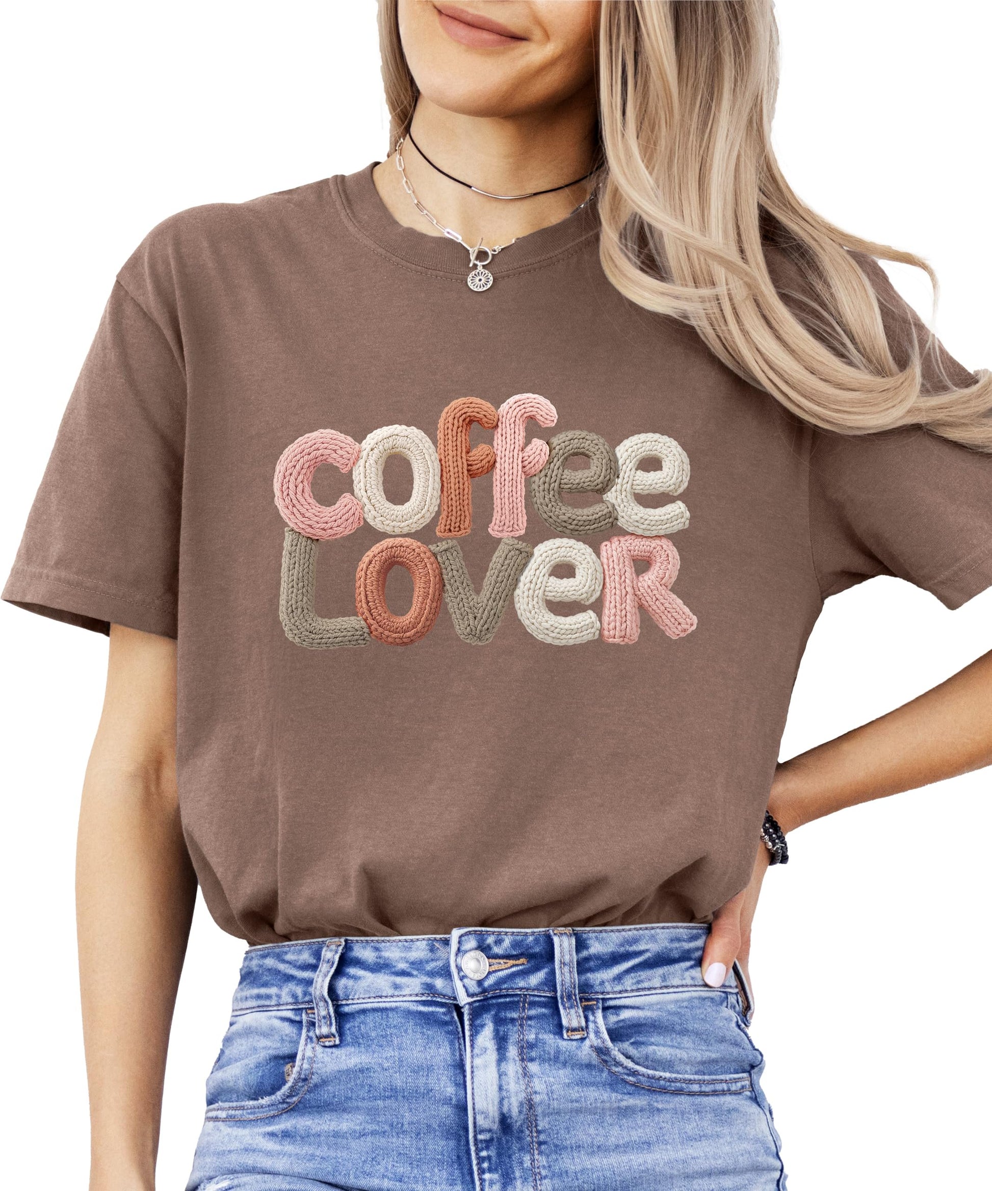 Close-up of coffee lover ink-printed graphic on ivory women's tee