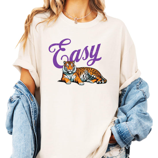 Easy Tiger funny women's t-shirt styled casually, showcasing full front graphic on ivory tee