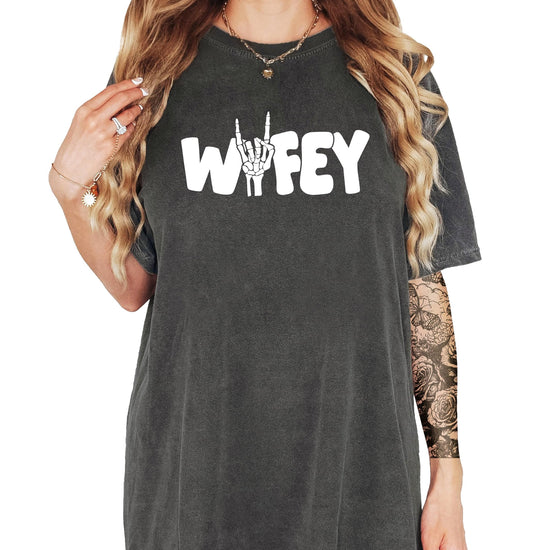 Wifey skeleton Halloween shirt with rock hand design on women's graphic tee