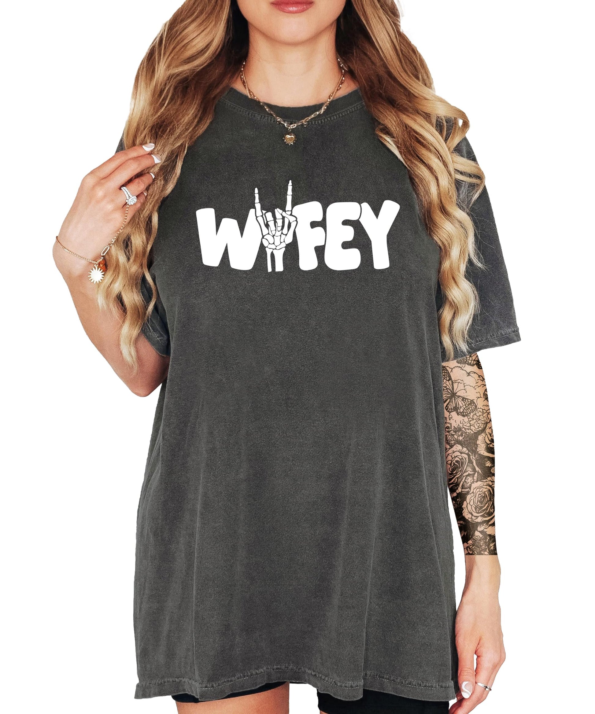 Wifey skeleton Halloween shirt with rock hand design on women's graphic tee