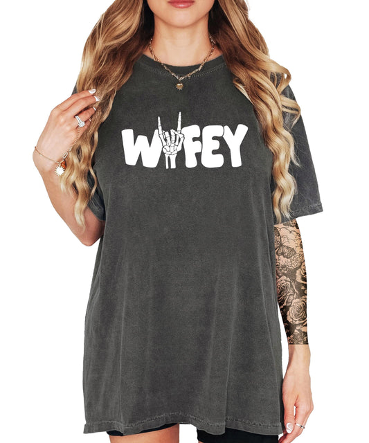 Wifey skeleton Halloween shirt with rock hand design on women's graphic tee