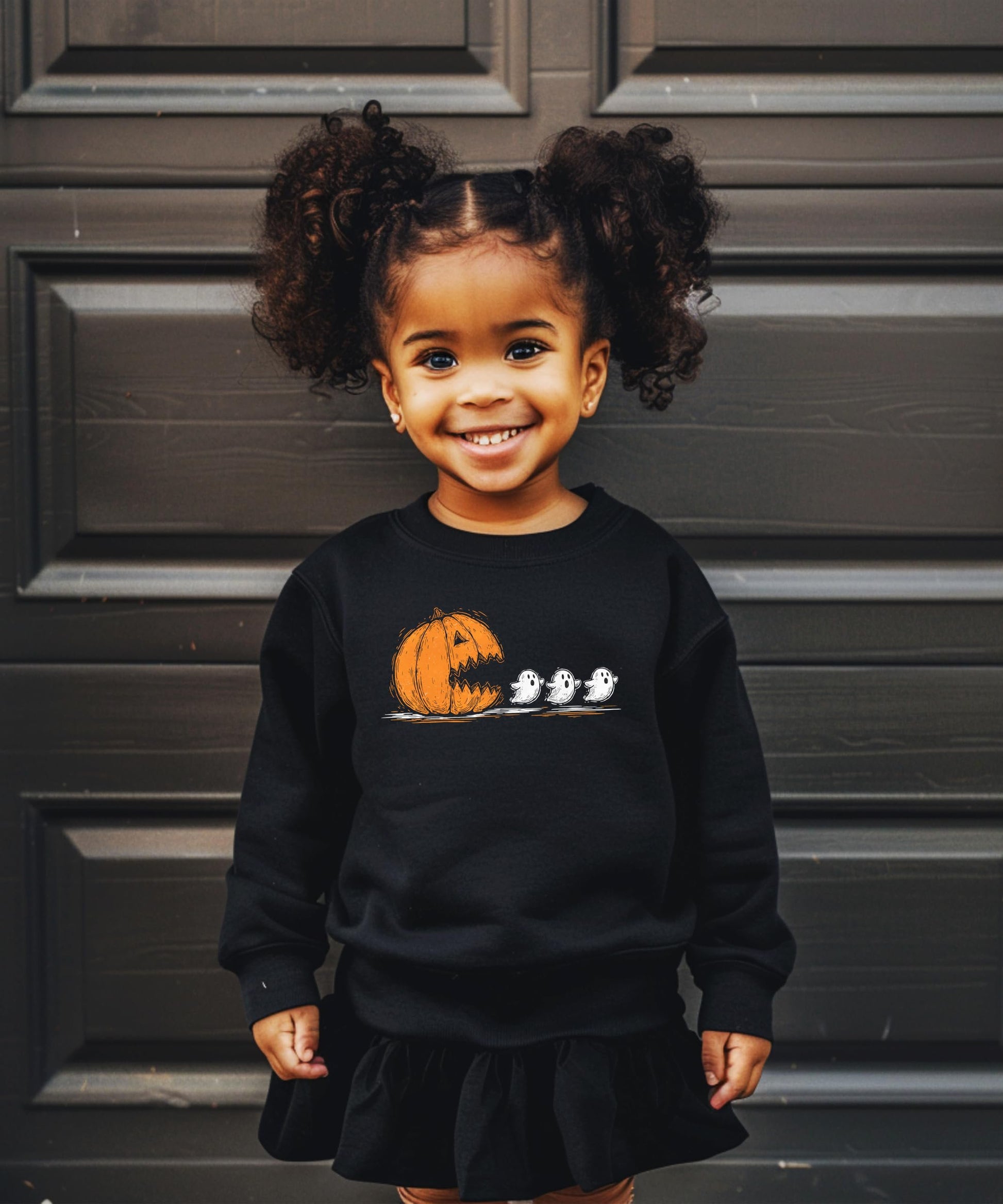 Flat lay of Olive Loves Apple pumpkin ghost Halloween sweatshirt showing full print detail