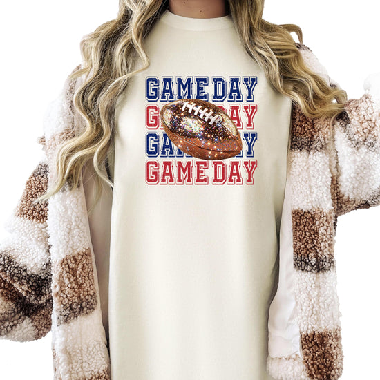 Women's football game day pullover shirt styled for fall tailgate season in blue and red