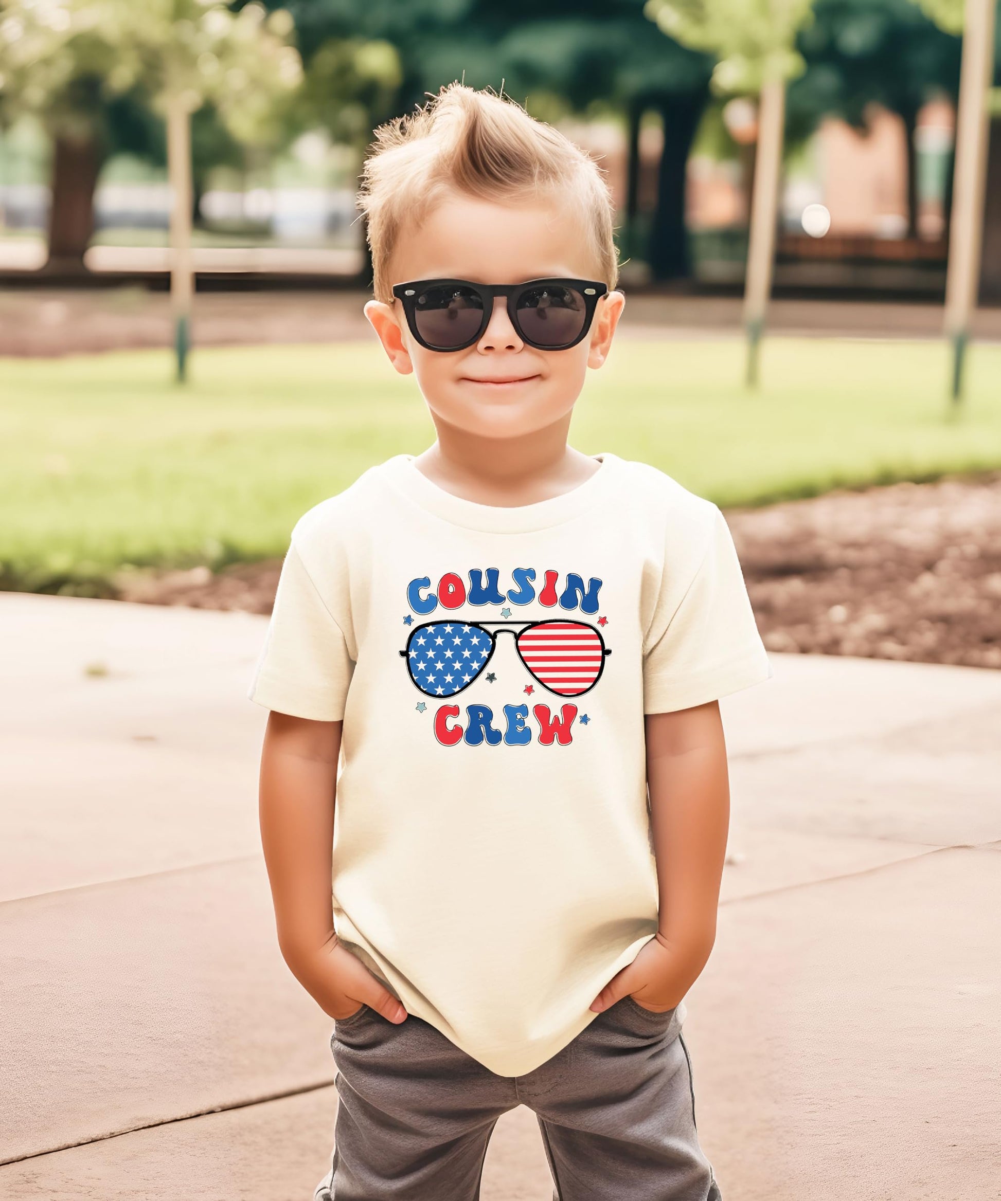 Youth model wearing Cousin Crew patriotic shirt in casual summer setting