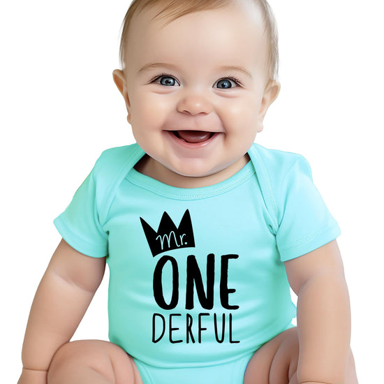 Baby boy wearing Mr. One-Derful 1st birthday bodysuit with bold graphic print