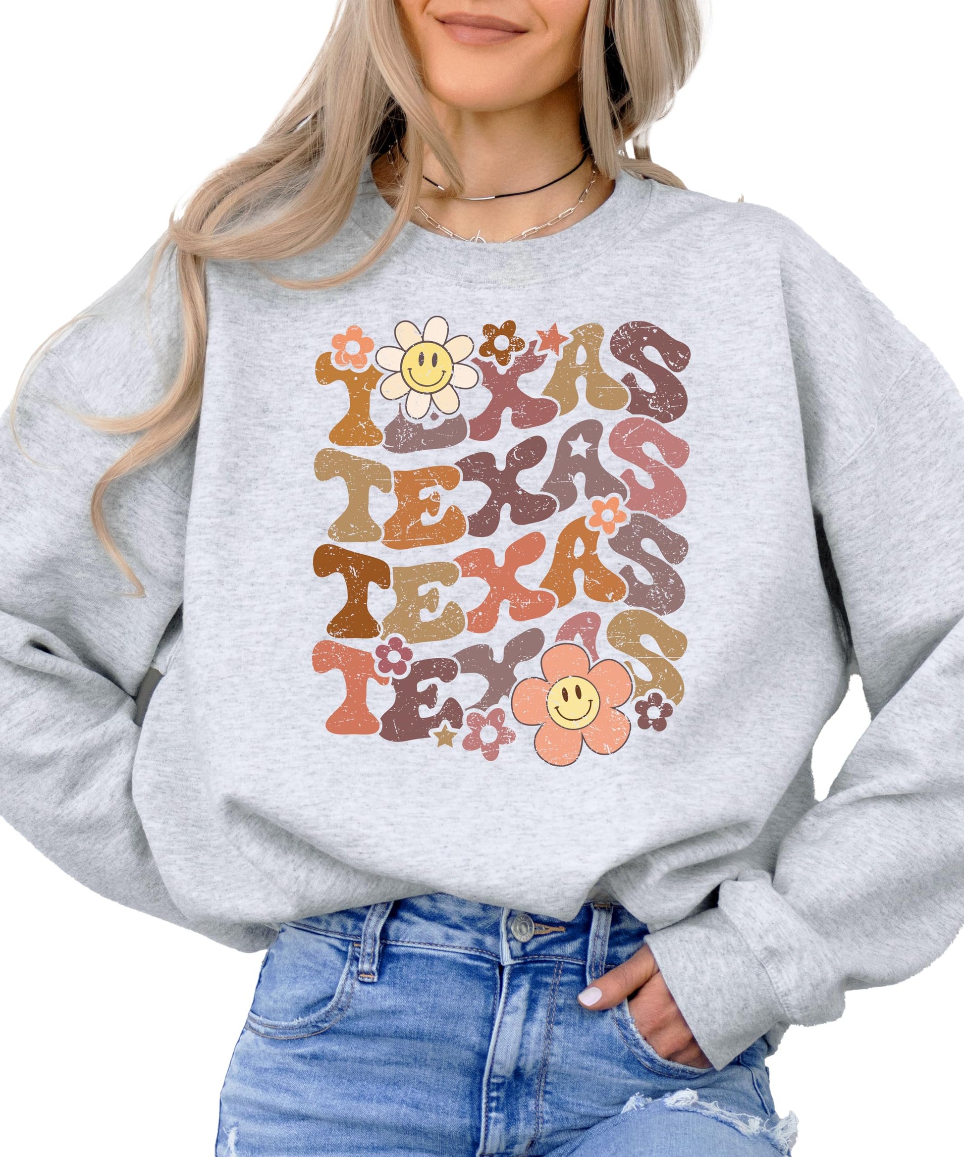 Texas sports sweatshirt laid flat showing full colorful flower design