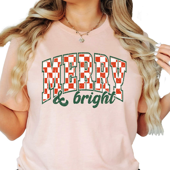 Merry and Bright retro check festive graphic tee detail shot on peach shirt