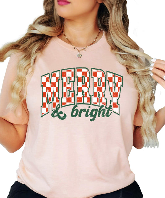 Merry and Bright retro check festive graphic tee detail shot on peach shirt
