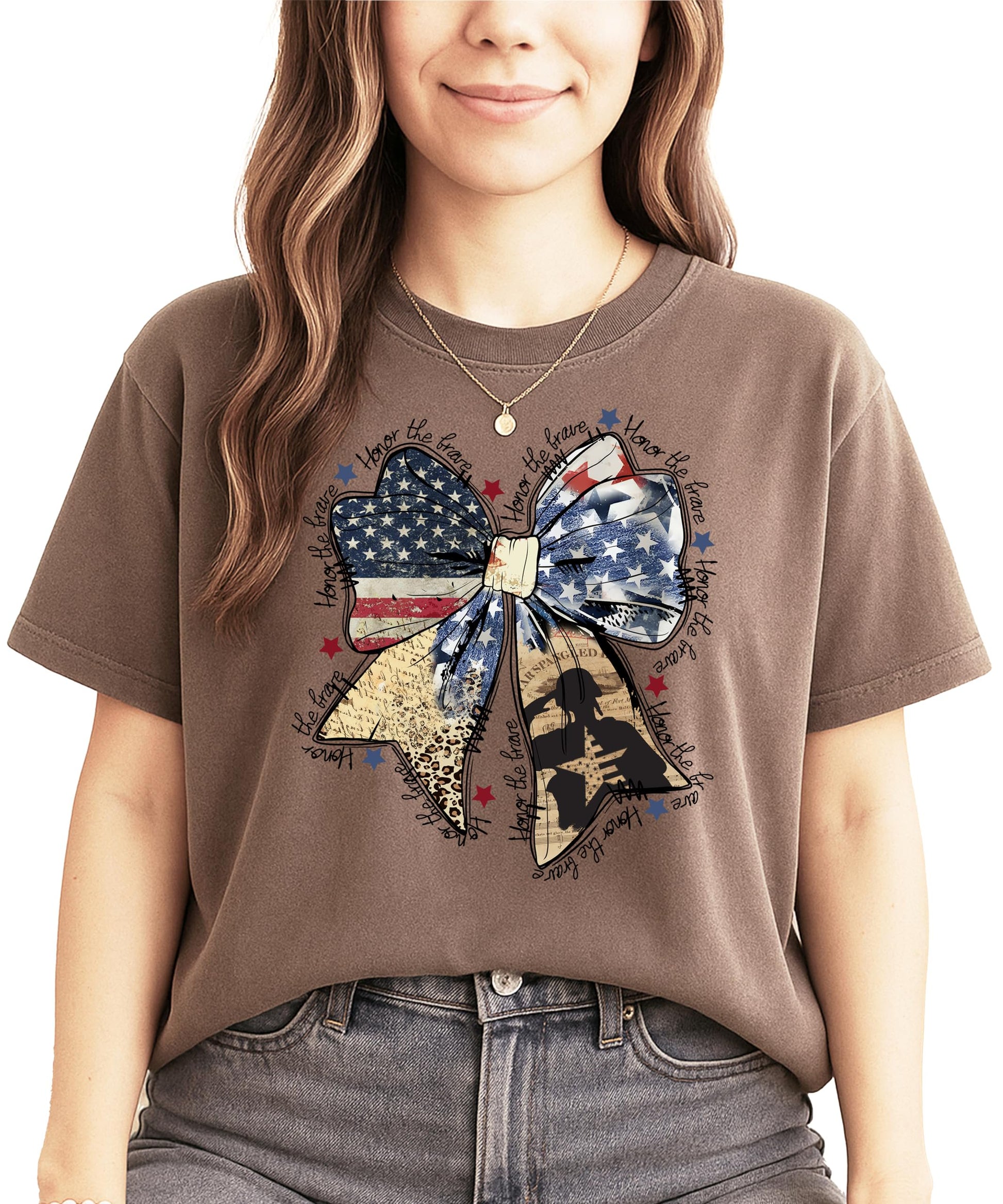 Close-up of Honor The Brave patriotic bow graphic print on women's blue graphic tee