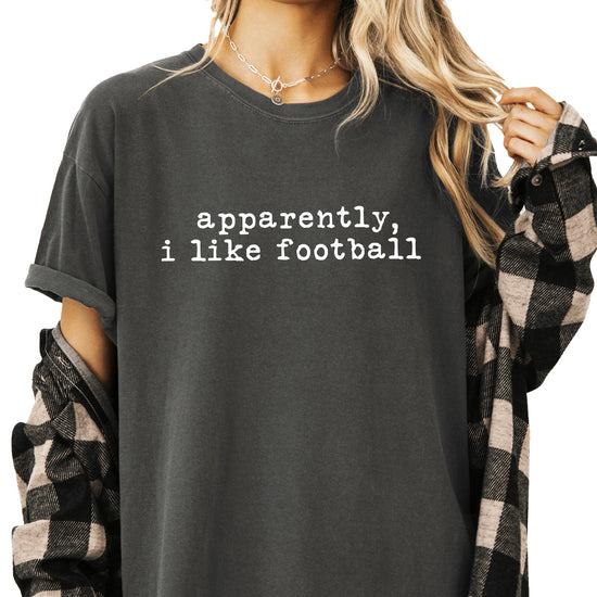 Apparently I Like Football women's tee laid flat showing full graphic design