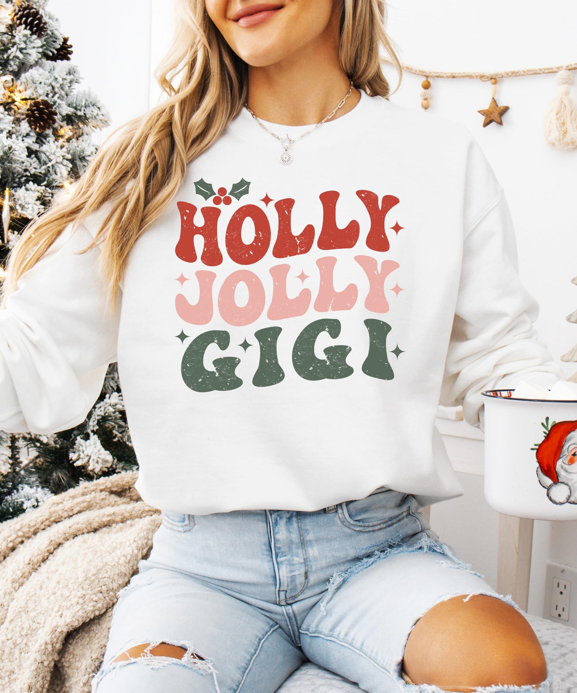 Detail shot of retro-style Holly Jolly Gigi holiday print on cozy gray sweatshirt