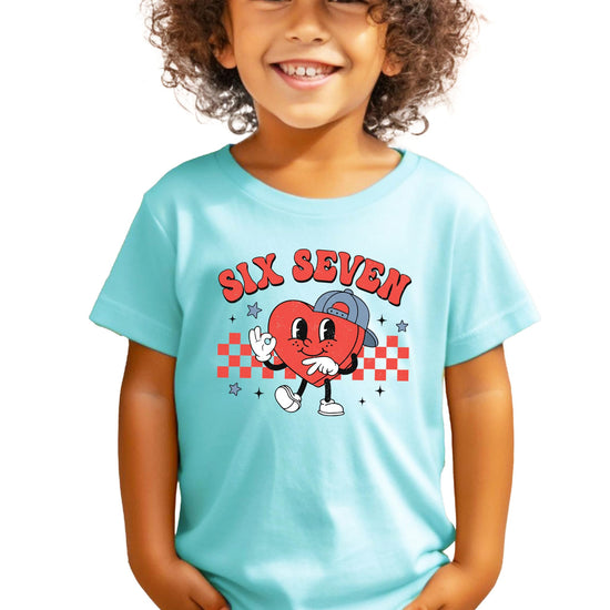 Boy wearing trendy six seven Valentine's Day graphic tee in fun casual style