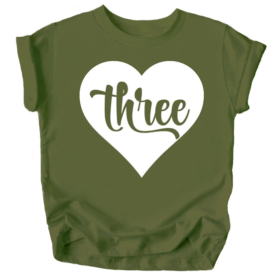 Close-up of Three in Heart birthday shirt print on pink toddler girl tee