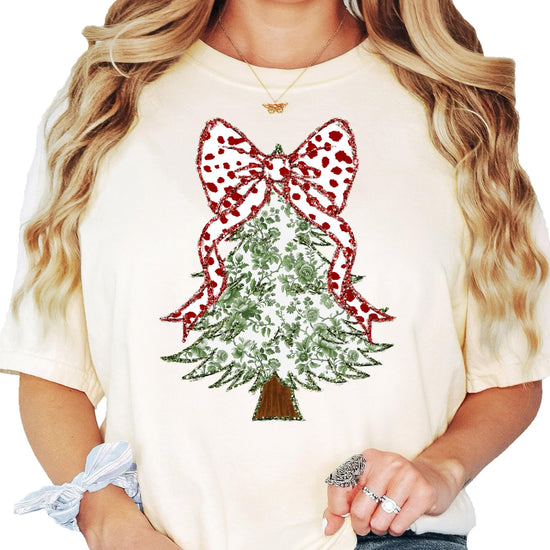 Women's holiday tee with faux glitter green floral Christmas tree and red polka dot coquette bow graphic