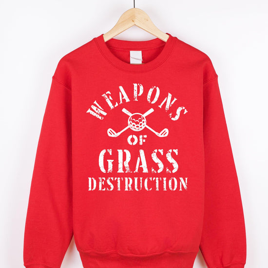 Detail shot of golf club and ball graphic design on black men's sweatshirt